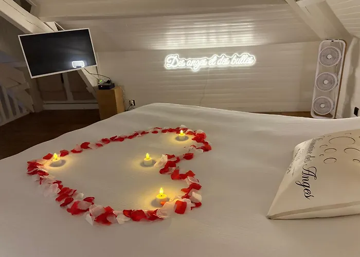 Au domaine des anges Gites avec Jacuzzi privatif dans la chambre